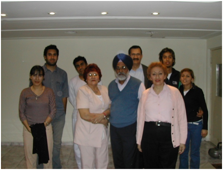 Martha Singh (right front) who provided her father Kartar Singh's passport copy